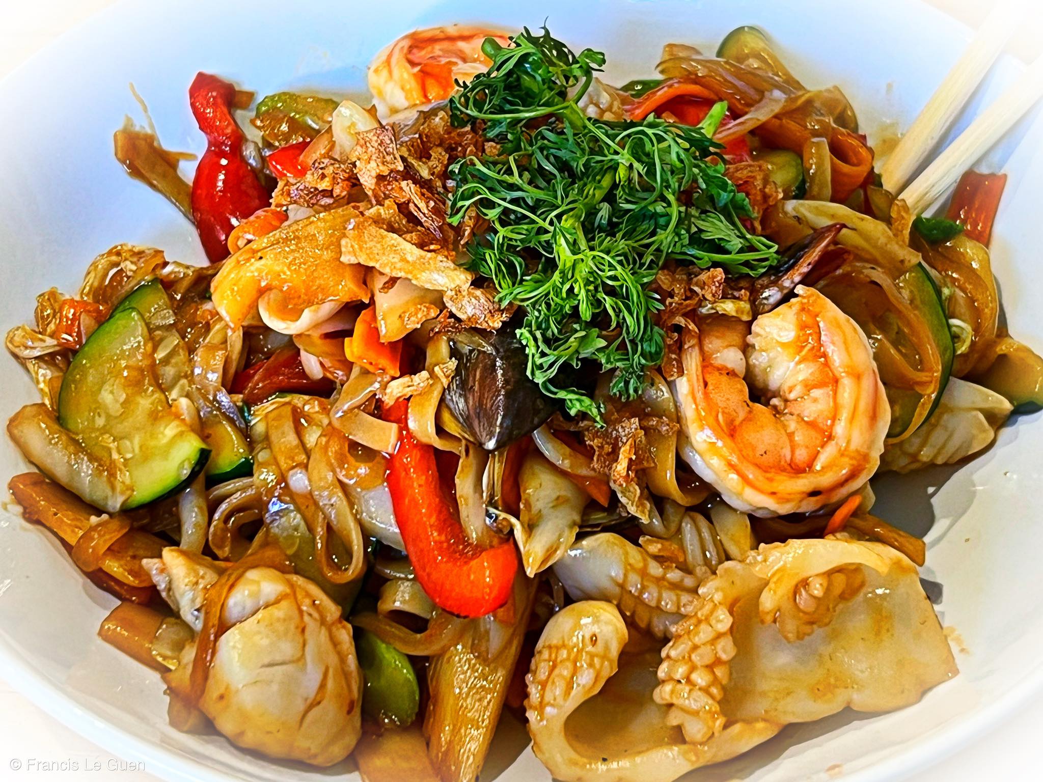 nouilles sautées aux fruits de mer. Choses vues